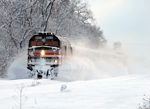 Amtrak Wolverine Train 351 bursts through the snow