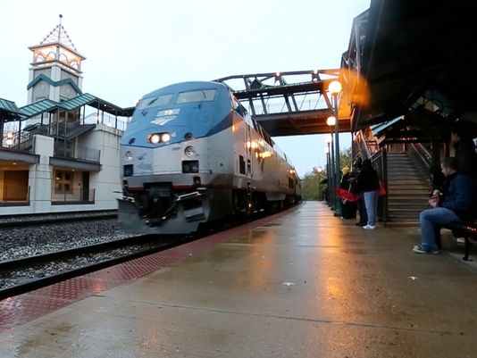 Passengers board the Hoosier State at the Amtrak platform in Lafayette. The state, Tippecanoe County, and the cities of Lafayette, West Lafayette, Crawfordsville, Rensselaer, Indianapolis and Beech Grove advertised for independent companies to submit plans to find efficiencies and close the gap between revenues and operating costs. Four groups submitted offers. (Photo11: File photo/Lafayette Journal & Courier )
